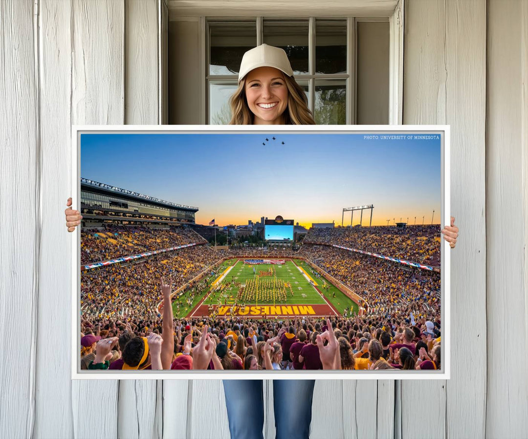 The University of Minnesota Golden Gophers Football Team Print, capturing a sunset scene, is ideal for gallery-quality wall art.