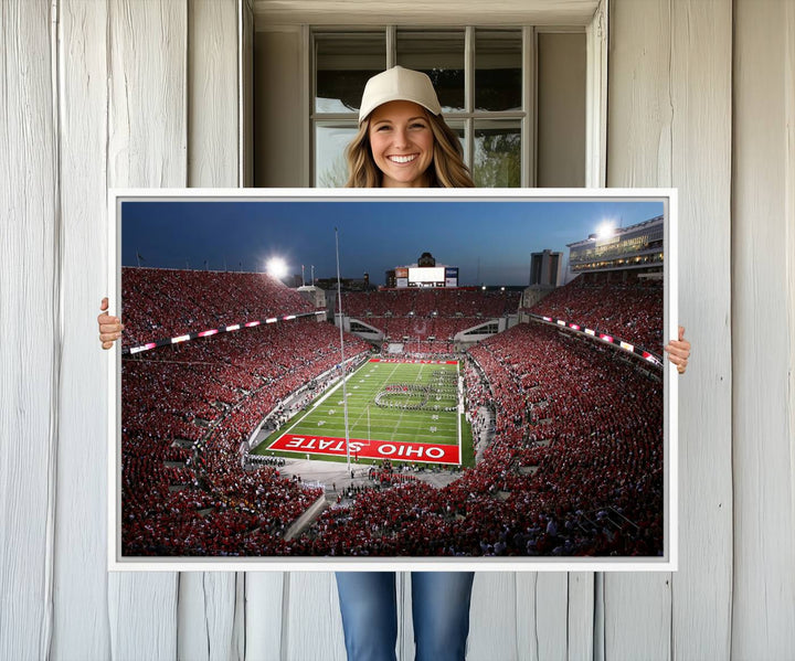 Premium gallery-quality canvas wall art featuring an aerial view of a packed Ohio State stadium at dusk, highlighting the Buckeyes.