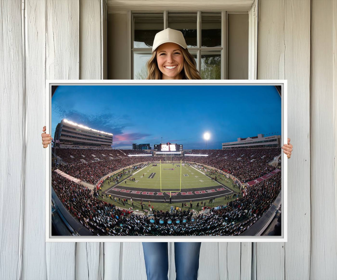 The wall art in the living room features a Texas Tech Red Raiders Football Team Print, showcasing Jones AT&T Stadium at dusk.