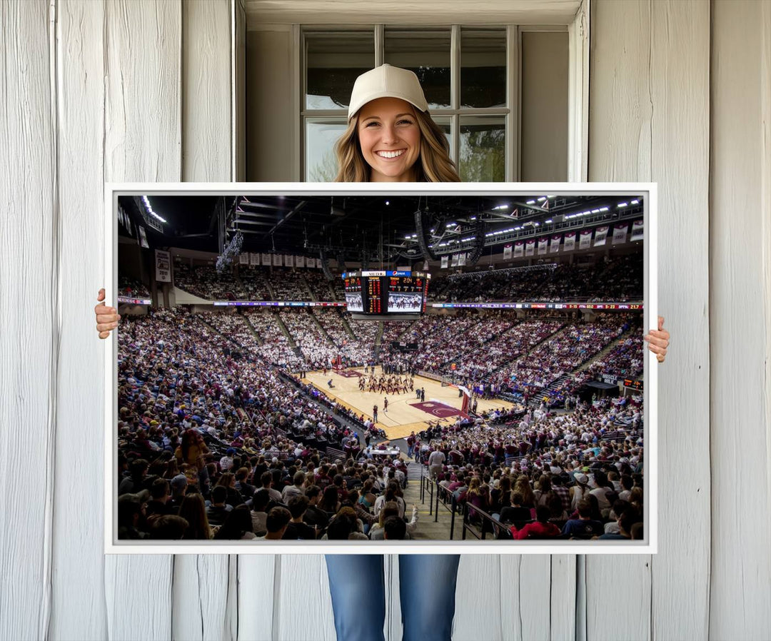 The Nebraska Basketball Arena Wall Art Canvas features an arena filled with Cornhuskers fans and players beneath a scoreboard.