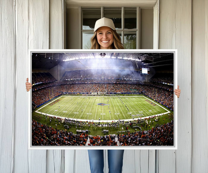 The modern living room features an Alamodome wall art canvas print, depicting a stadium filled with spectators for a UTSA Roadrunners game.