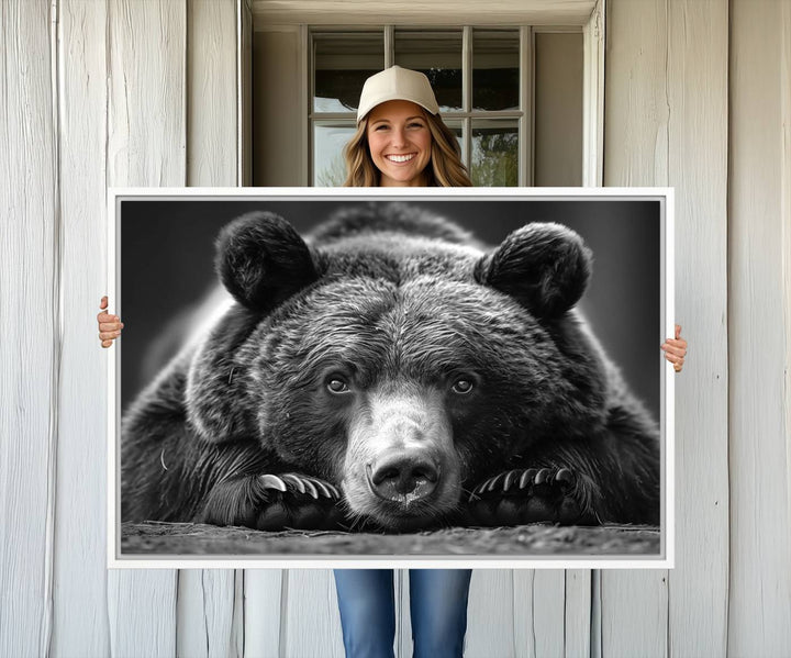 A black and white canvas print titled Resting Grizzly 399 Bear is displayed prominently.