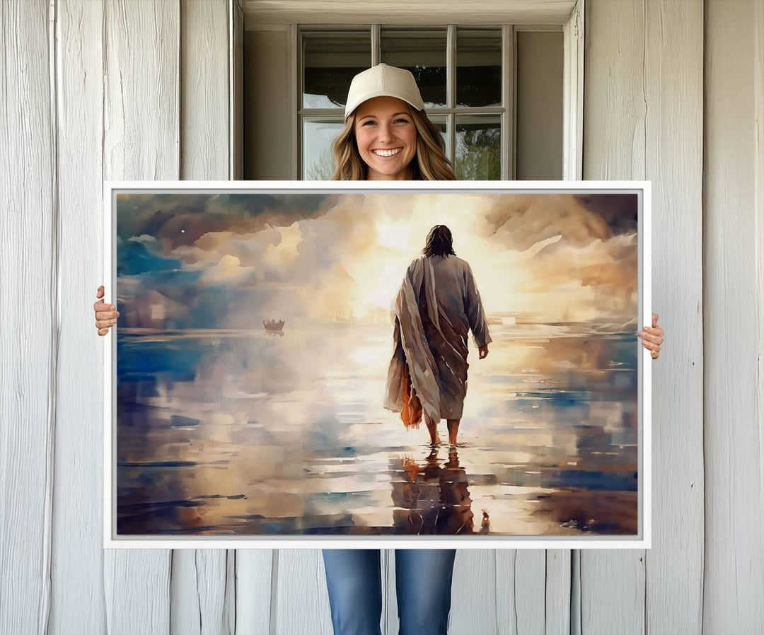 The wall art depicts a robed figure walking on water towards a boat, framed by a stunning sunset. This is showcased in the Jesus Walking on Water Triptych Canvas Print.