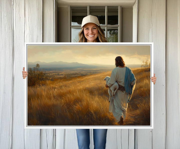 The wall art, titled Jesus the Good Shepherd, depicts a golden field at sunset.