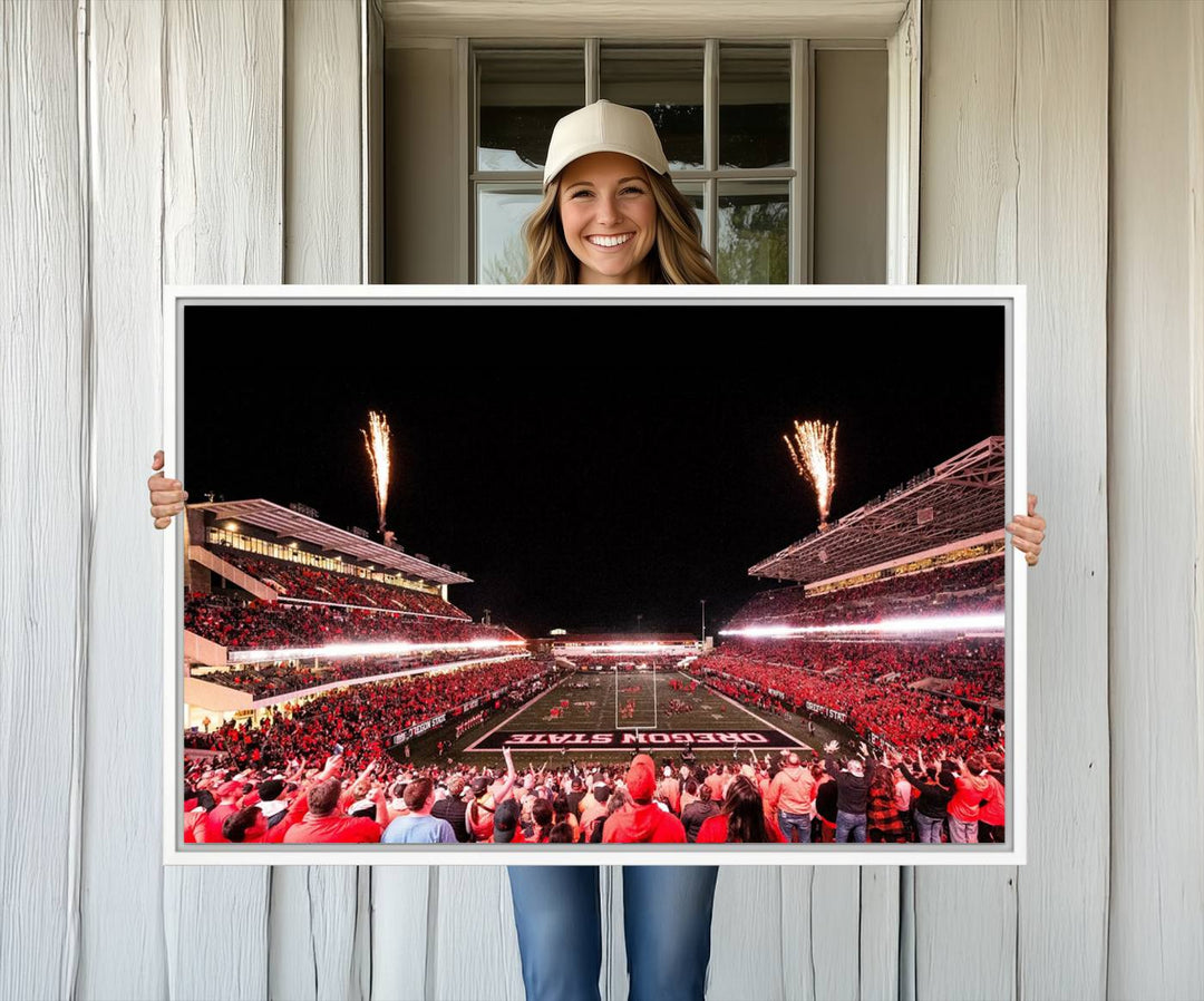 At Corvallis Reser Stadium, vibrant wall art captures the spirit of Oregon State Beavers football against a backdrop of a fireworks-lit night sky.