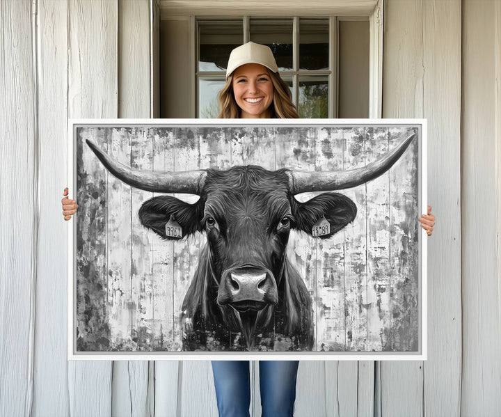 Abstract Longhorn Bull canvas print, featuring rustic Texas-themed wall art on a wooden background, ideal for Western decor.