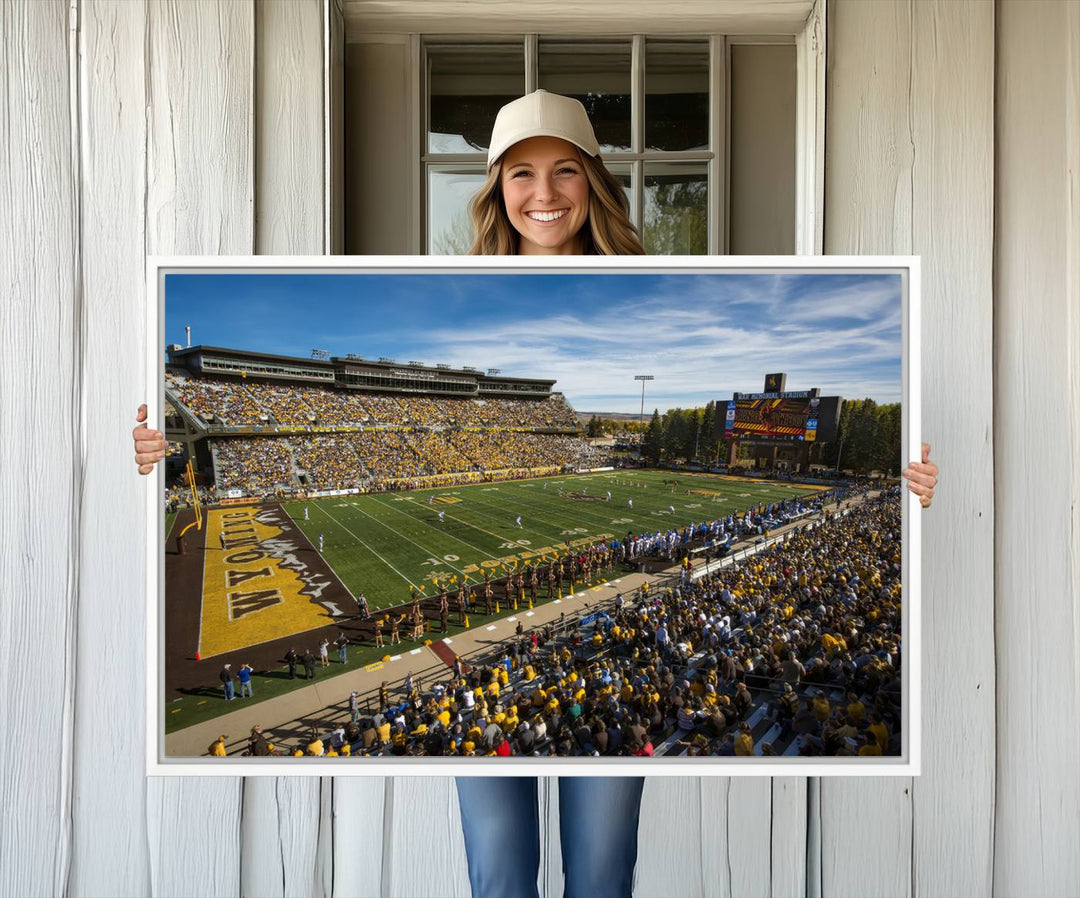 Canvas Wall Art Print: University of Wyoming Cowboys action at Jonah Field War Memorial Stadium under a sunny blue sky.