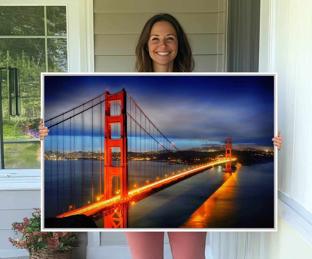 A large wall art San Francisco canvas print of the Golden Gate Bridge at twilight is displayed on a porch.