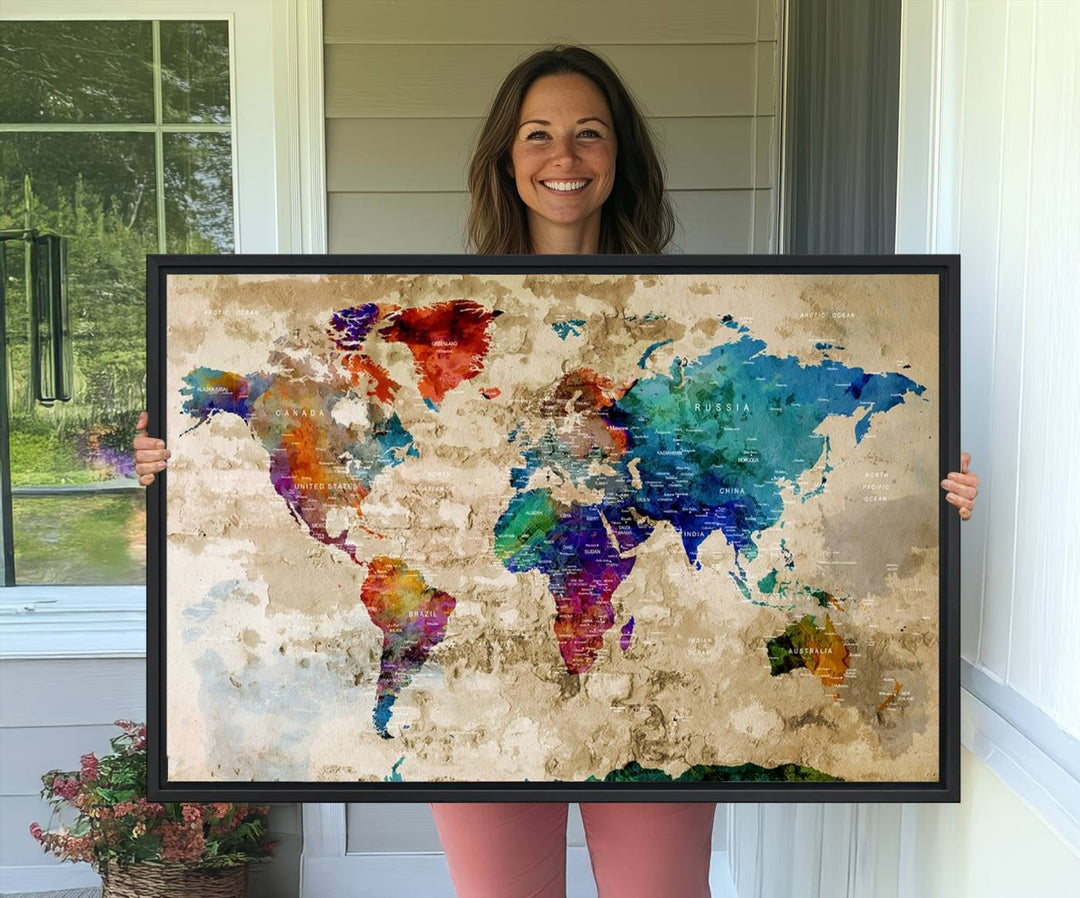 An Abstract Large Watercolor World Map Canvas Print hangs prominently.