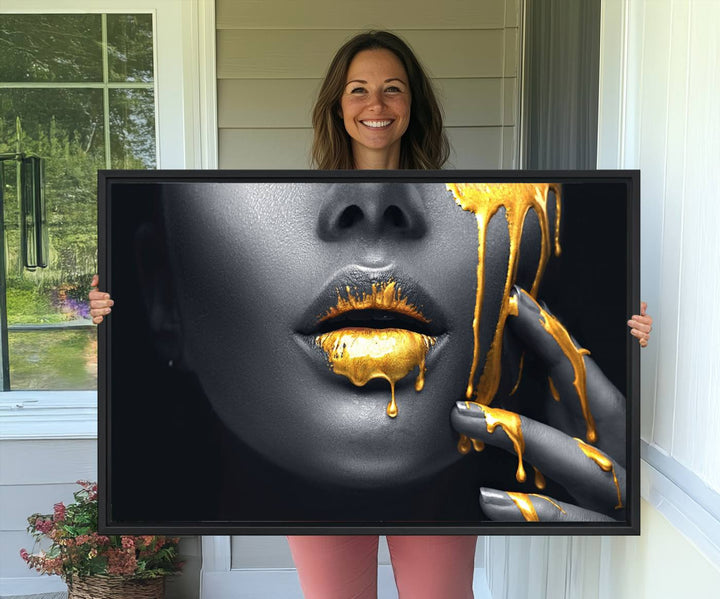 The Gold Lips and Black Woman Makeup Canvas Print features a chic monochrome face design, making it ideal for a modern dining room.