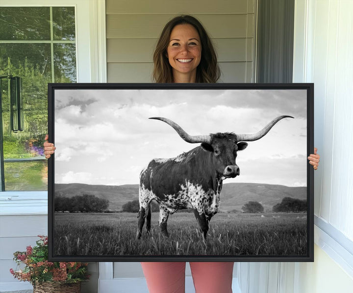 A Black and White Longhorn Texas Cow Canvas Wall Art.