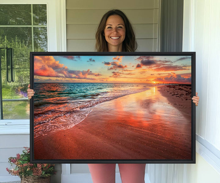 A Vibrant Sunset Beach Canvas Print with ocean waves and sandy shoreline enhances coastal-themed interiors.