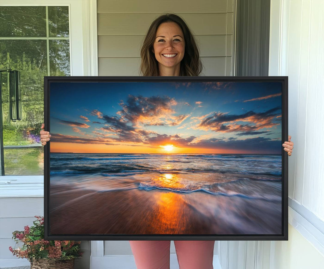 The Sunset on the Ocean canvas adds coastal ambiance to the wooden wall.