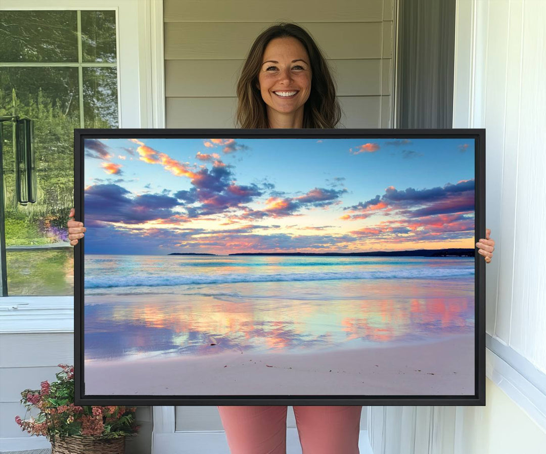 The Tranquil Pastel Sunset Beach Triptych Canvas Art hangs, showcasing its serene beauty.