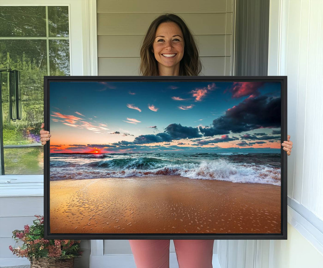 A large 3-panel sunset ocean beach canvas is displayed above the counter.