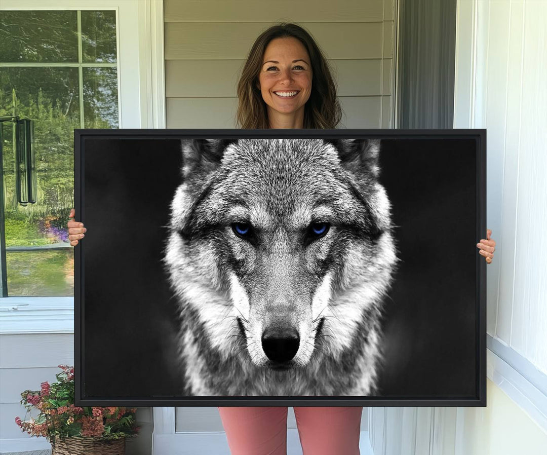 A ready-to-hang Black and White Wild Wolf Wall Art Canvas Print.