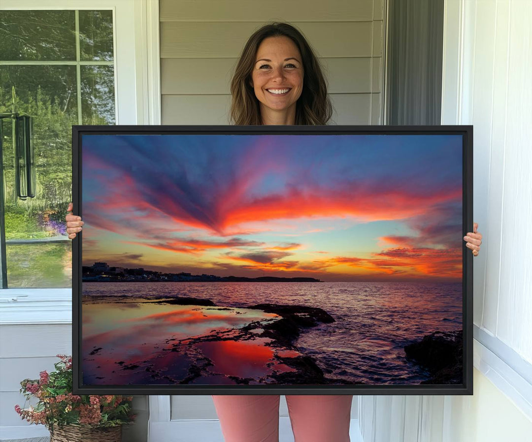 The Glorious Sunset on The Beach canvas print adorns the dining room.