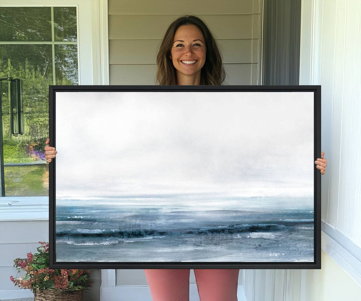 The dining area features Blue Ocean Abstract Artwork on canvas.