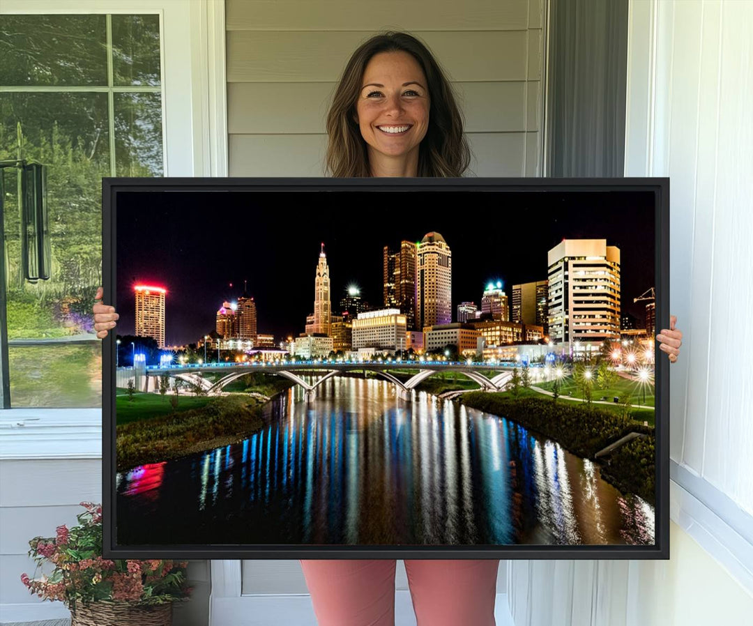 The Columbus City Lights Night Skyline Wall Art Canvas Print adorns the wall.