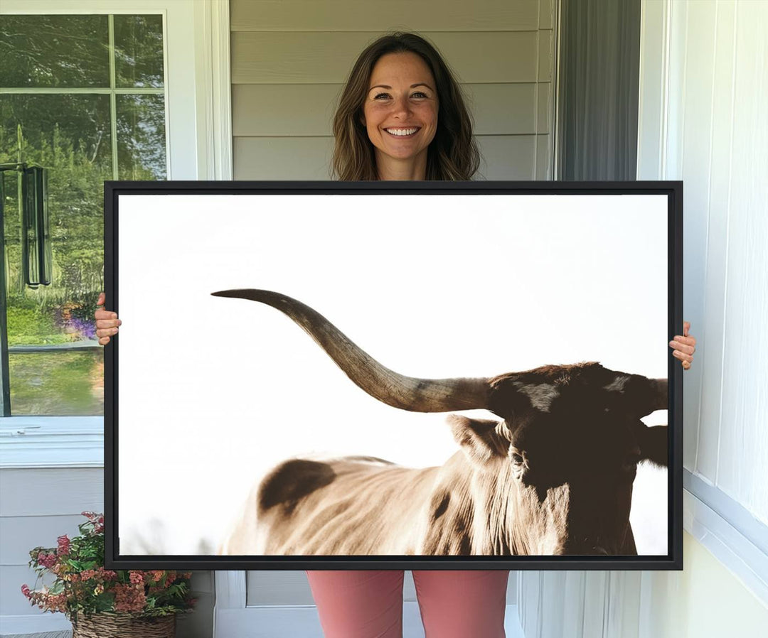 A 3-panel Texas Longhorn canvas adds a touch of rustic Western decor.