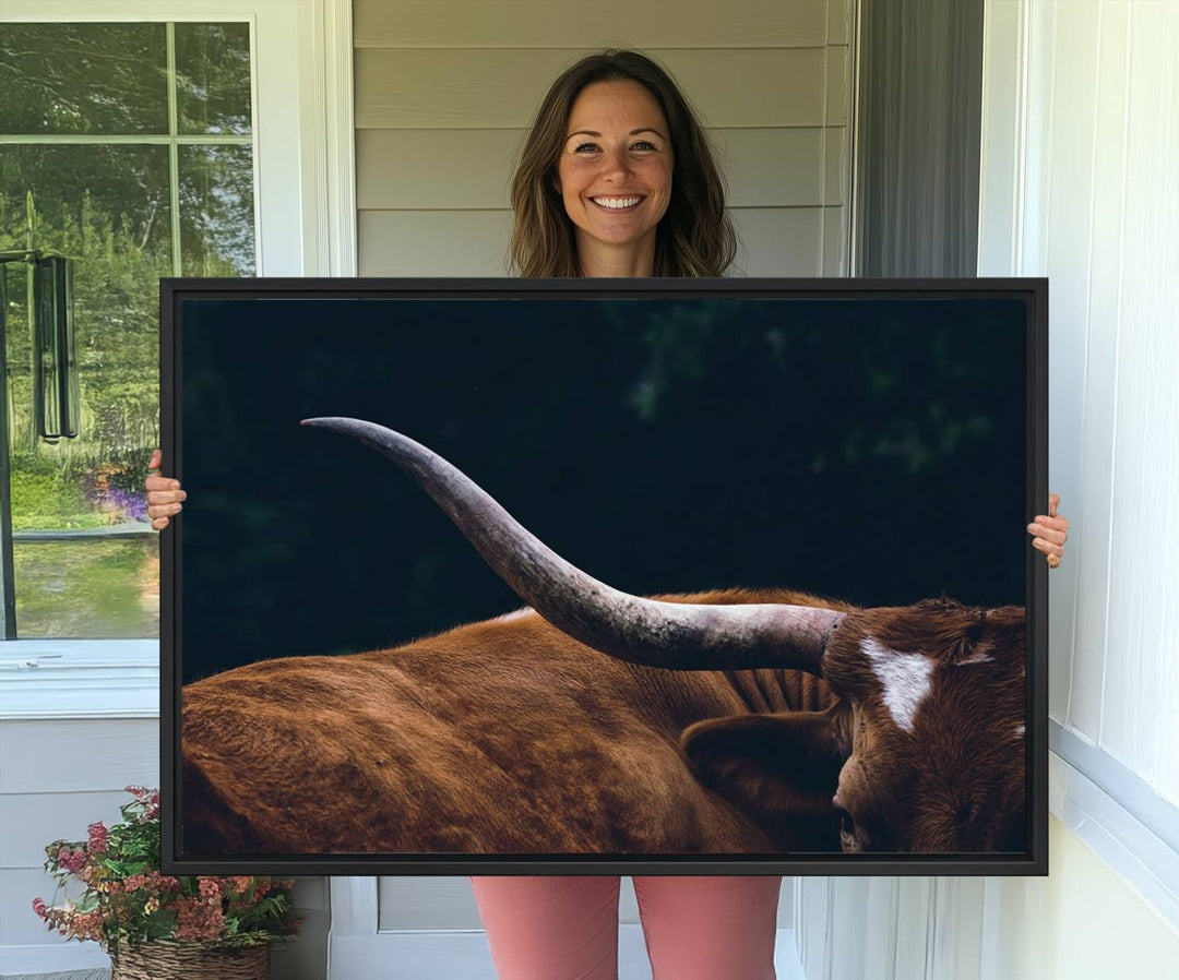 The kitchen dining area features a Texas Longhorn Bull wall art.