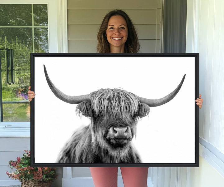 A Scottish Highland Cow Art Canvas adds charm to the farmhouse decor.