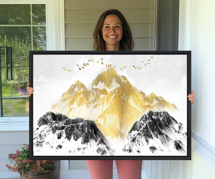 Golden Mountain Triptych Wall Art features gold-tinted mountains and birds.