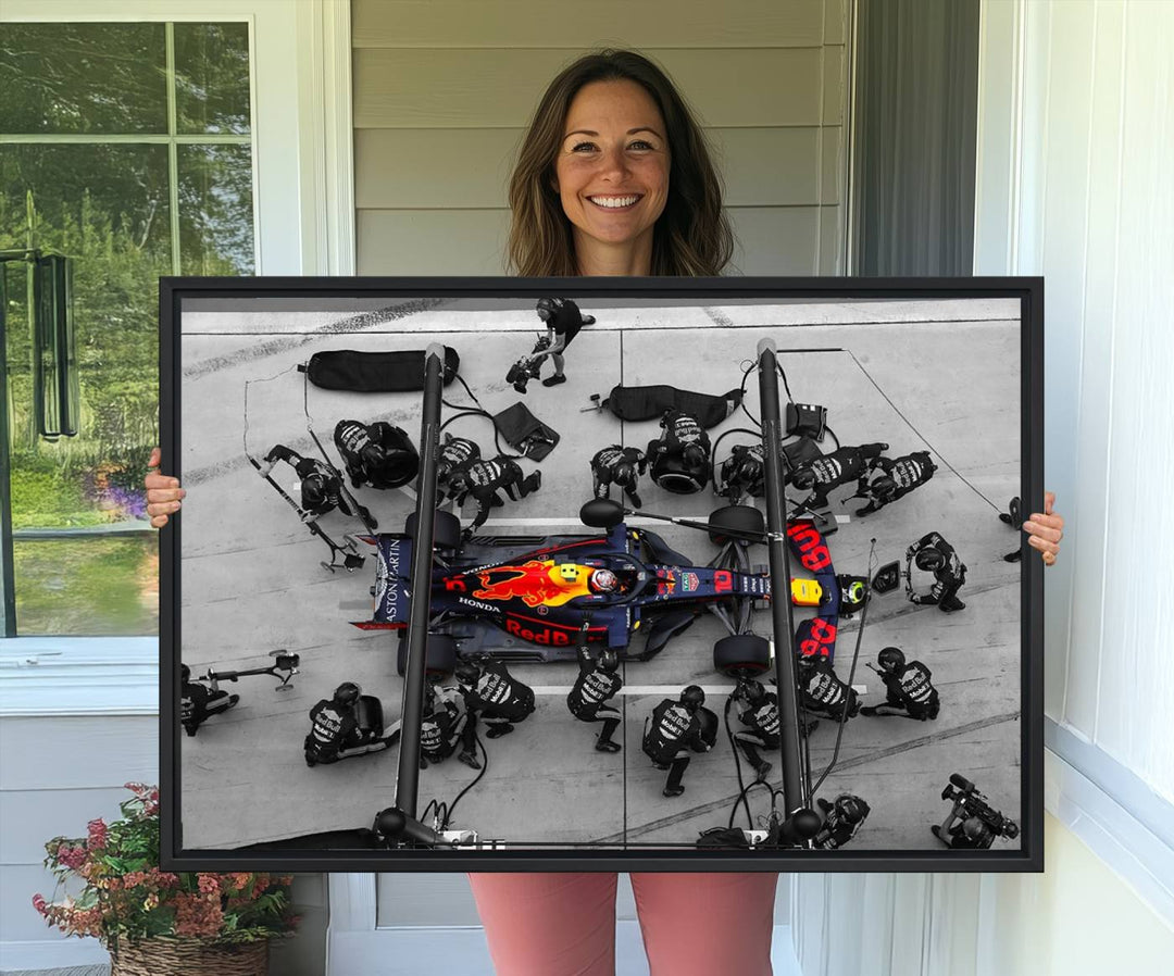 Red Bull Formula 1 Canvas Wall Art Print: An aerial view of a Formula 1 pit stop featuring a Red Bull car on premium canvas.