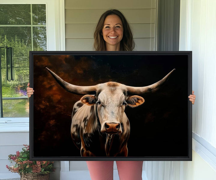 A large 3-panel Texas Longhorn canvas print dominates the space.