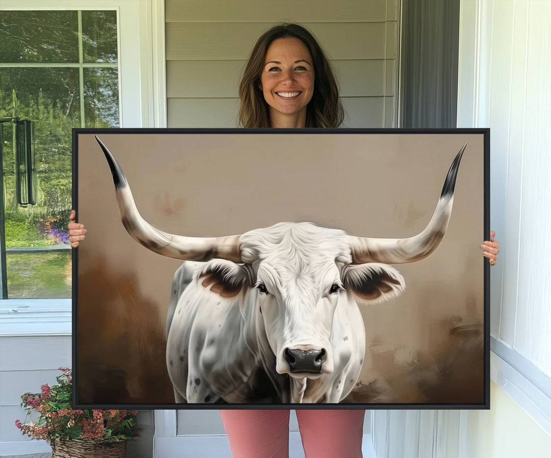 The kitchen features a striking canvas print of a Longhorn Bull.