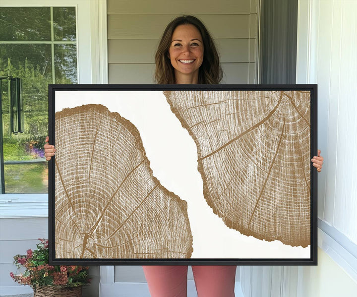 The rustic wall art features two large tree rings, beautifully framed and displayed to create a nature-inspired décor.