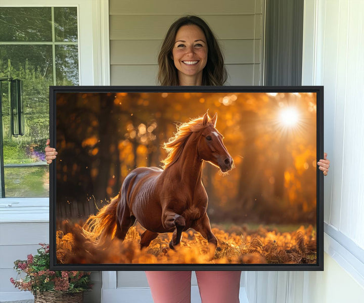 The Running Horse Sunset Forest Wall Art Canvas Print showcases a gallop in an autumn forest with sunlight streaming through the trees.