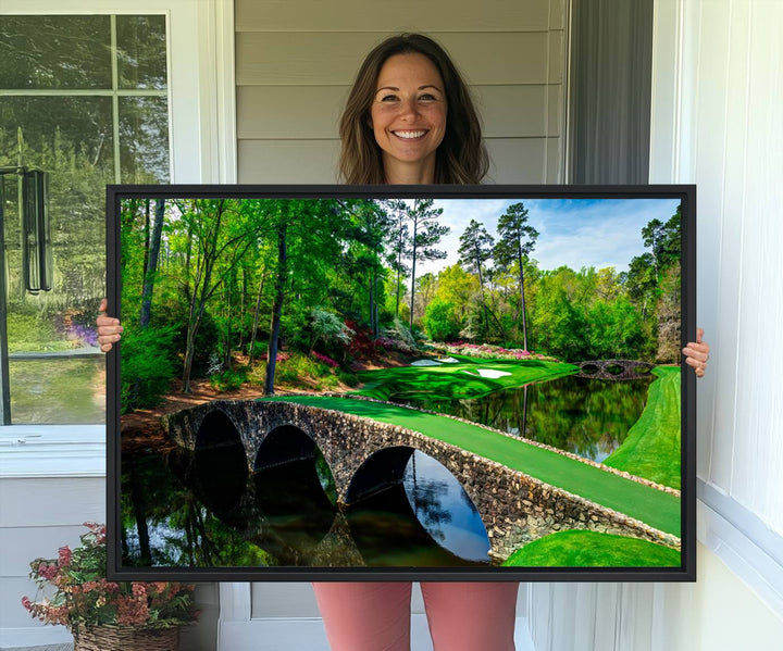 The wall art from Augusta National Golf Club showcases a panoramic bridge set against rich, lush greenery on a framed triptych canvas.