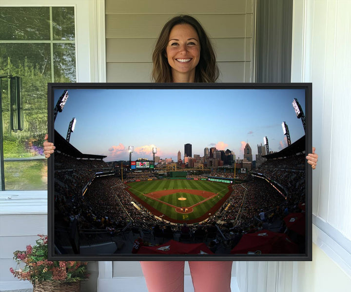 The PNC Park Evening Game Canvas, featuring a skyline backdrop, is displayed on the wall.