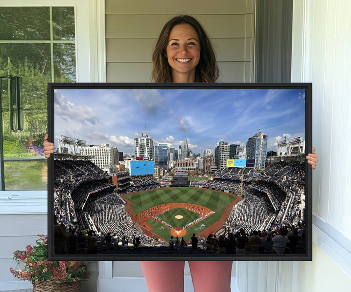 The San Diego Padres Baseball Canvas Print of Petco Park enhances the modern kitchen-dining area.