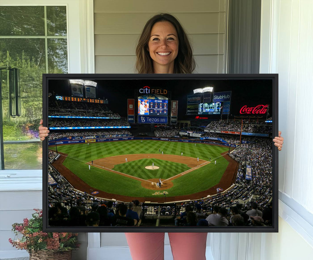 A print of the Oakland Athletics game at RingCentral Coliseum hangs on the wall.