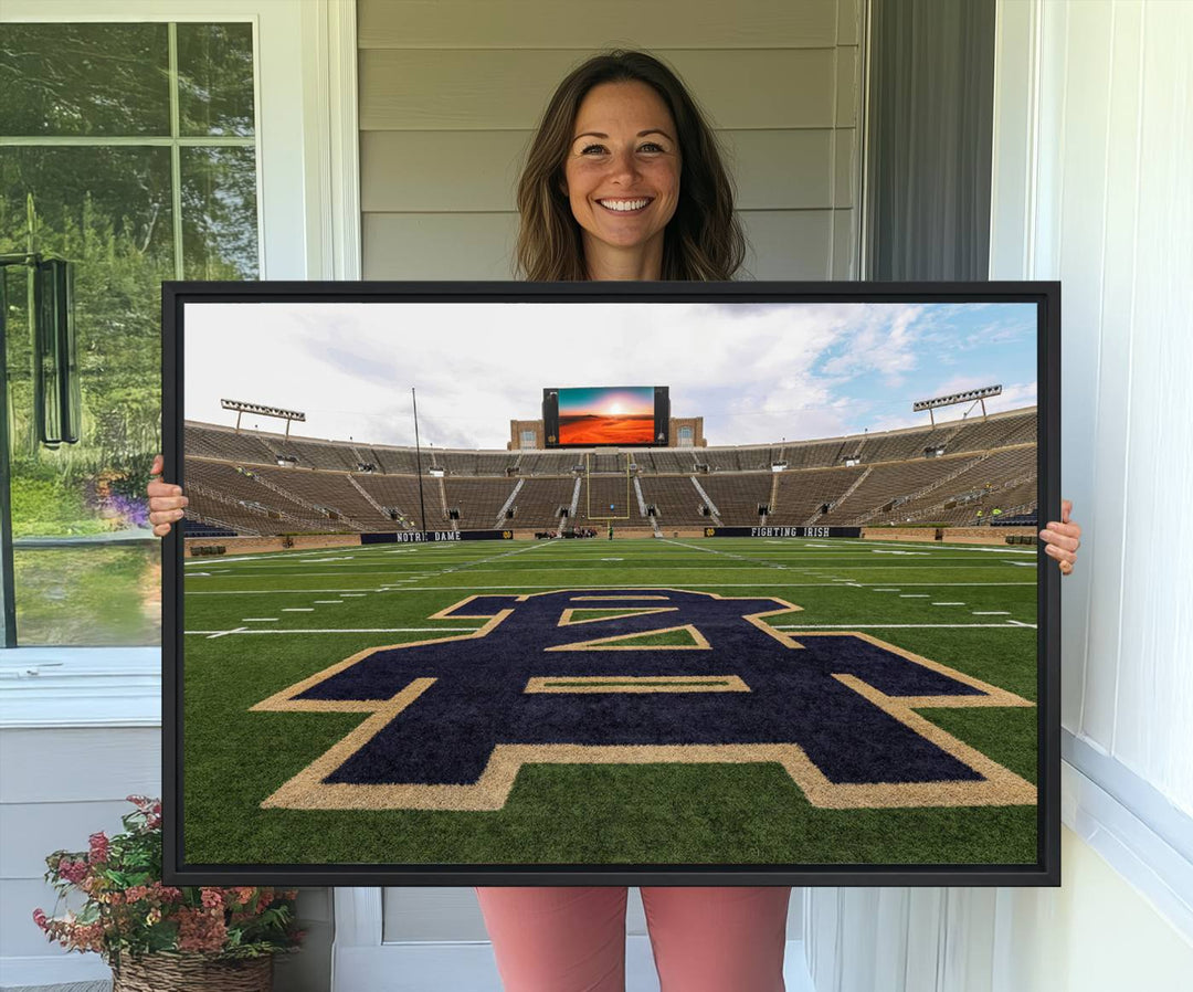 Notre Dame Stadium Triptych: This ready-to-hang giclee canvas print features a vibrant depiction of the football field adorned with an A logo and a stunning sunset.