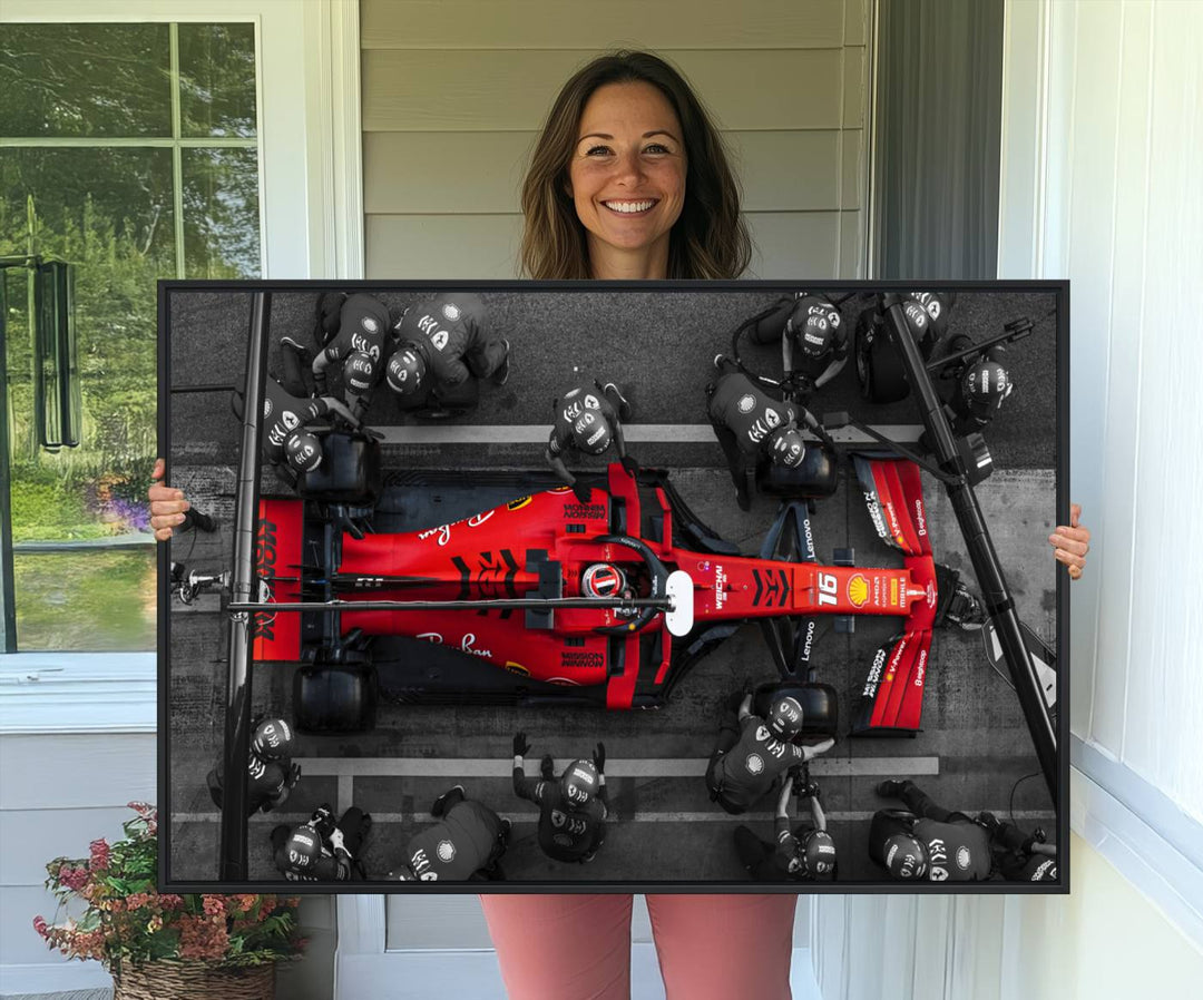 Ferrari Pit Stop Canvas Wall Art displayed prominently in the living room.