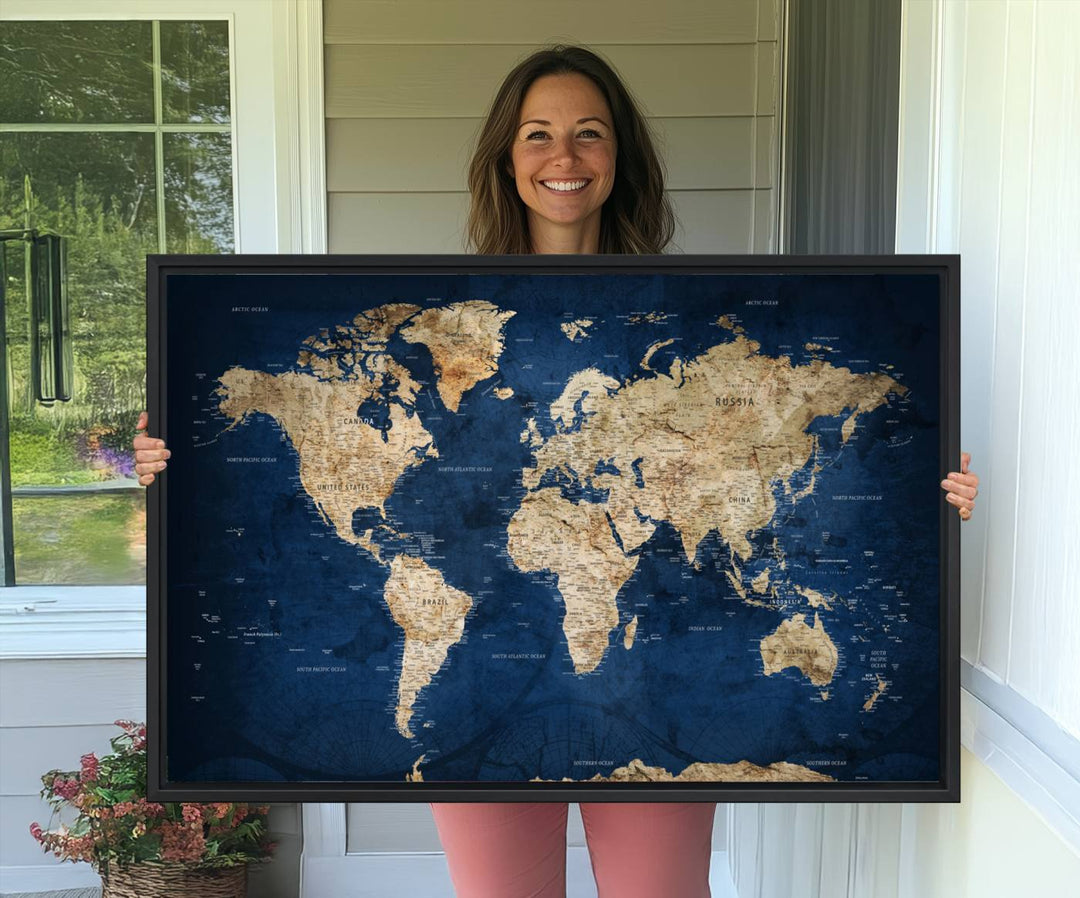 A personalized world map canvas print hangs above.