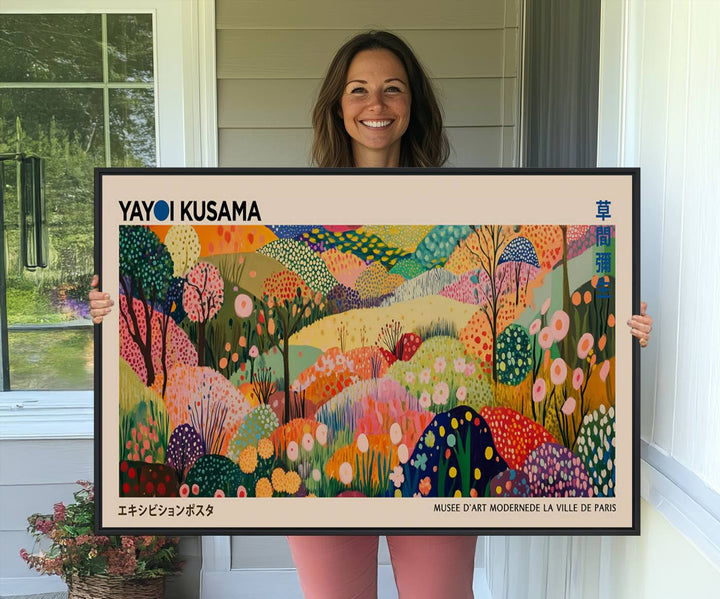 A Yayoi Kusama Wall Art Canvas Print featuring vibrant abstract floral patterns is displayed in a tranquil forest setting.