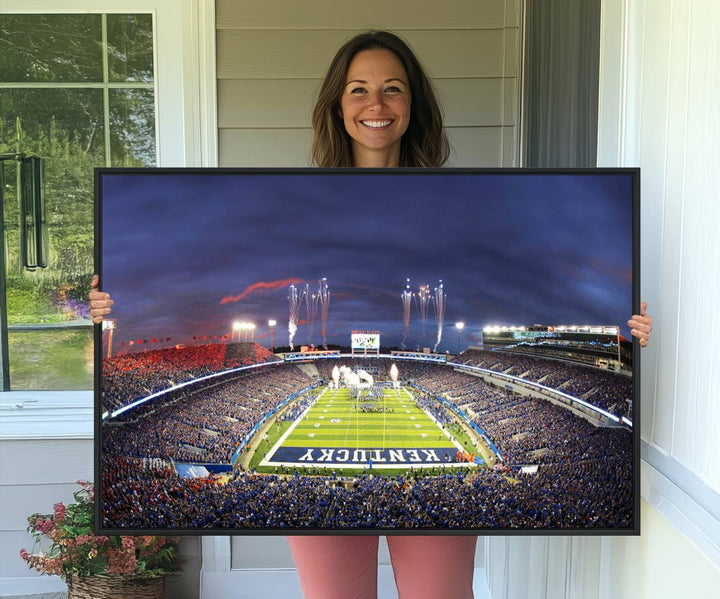 A filled stadium at dusk and fireworks overhead are beautifully captured in the Kroger Field Canvas Wall Art - Sunset Football Stadium Decor.