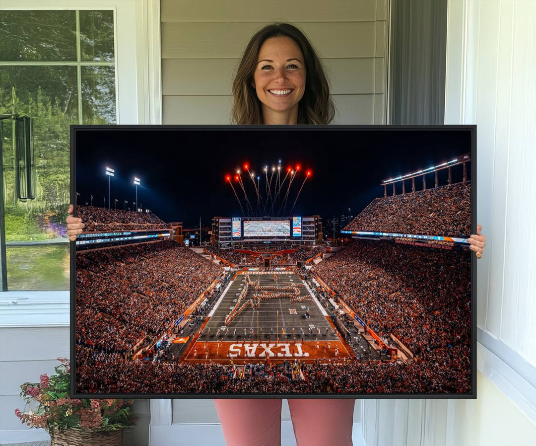 A Texas Memorial Stadium canvas print with fireworks embellishes the modern living room.