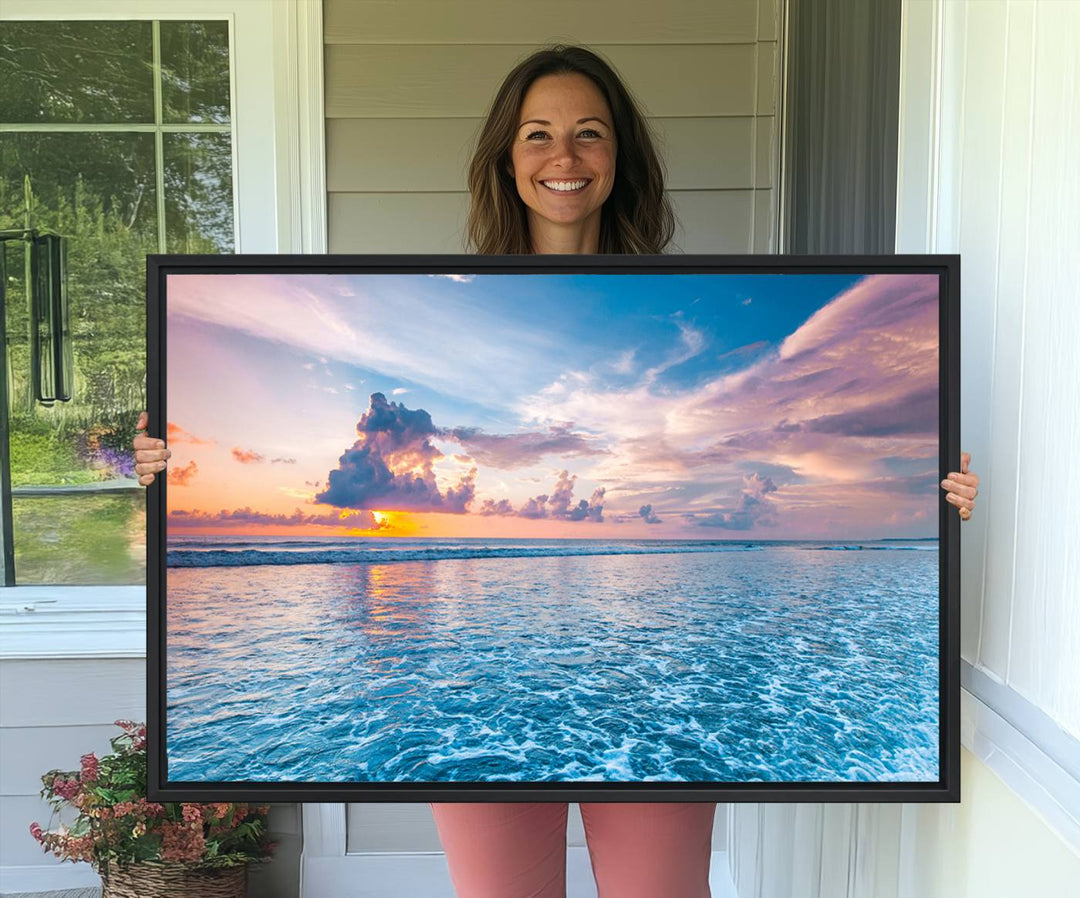 An Ocean Sunset Canvas Wall Art depicting a vibrant sky and rolling waves.