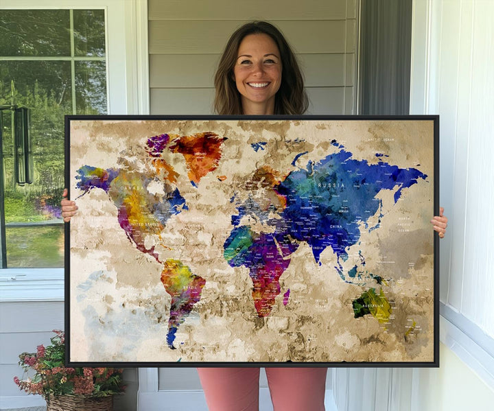 Watercolor World Map Canvas Print with gallery-wrapped edges.