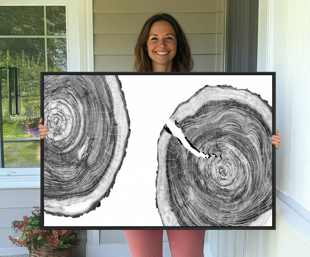 The modern black and white tree rings canvas art adds minimalist geometric decor with nature inspiration.