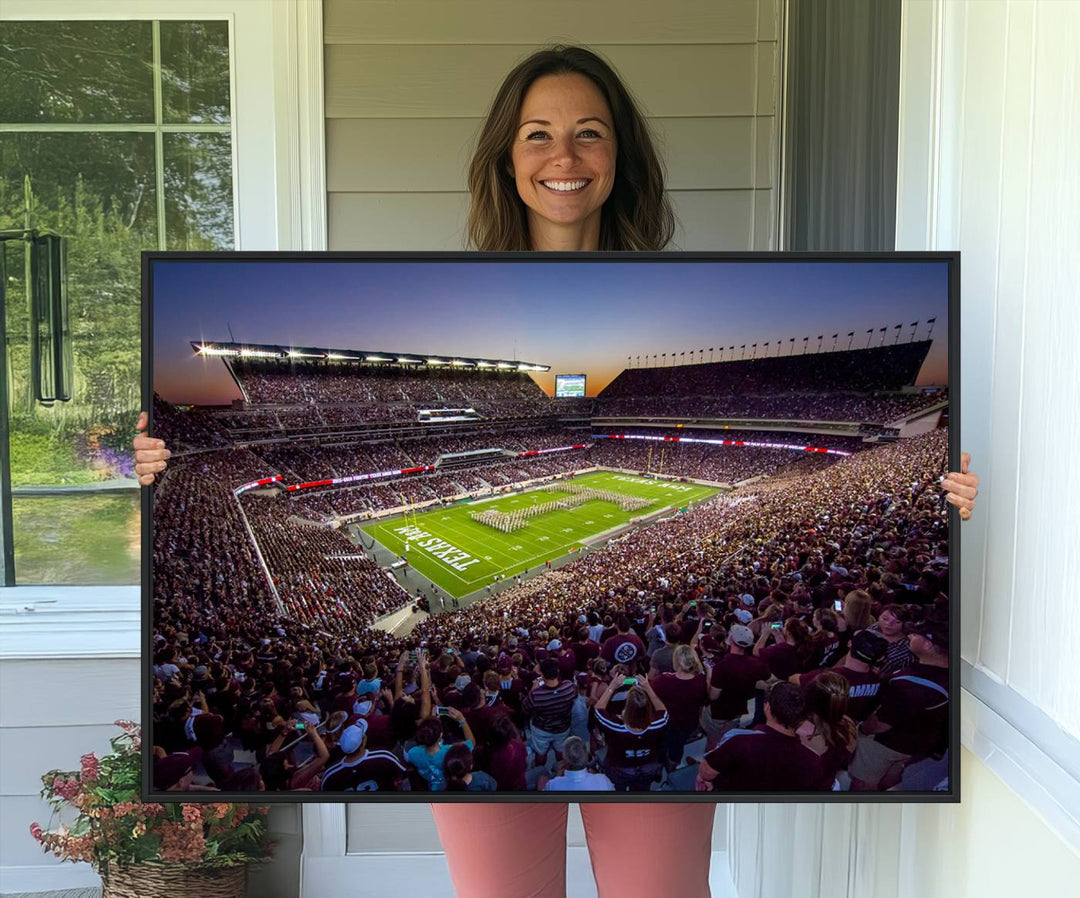 A vibrant canvas print of Texas A&M Aggies at College Stations Kyle Field Stadium captures the energy of fans cheering as the band marches at sunset.