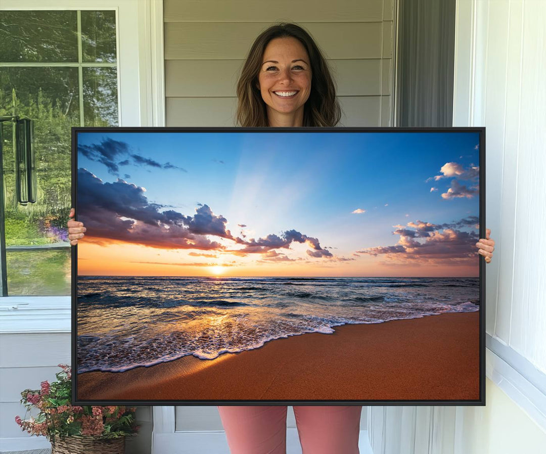 A Golden Hour Beach Sunset canvas hangs in the living room.