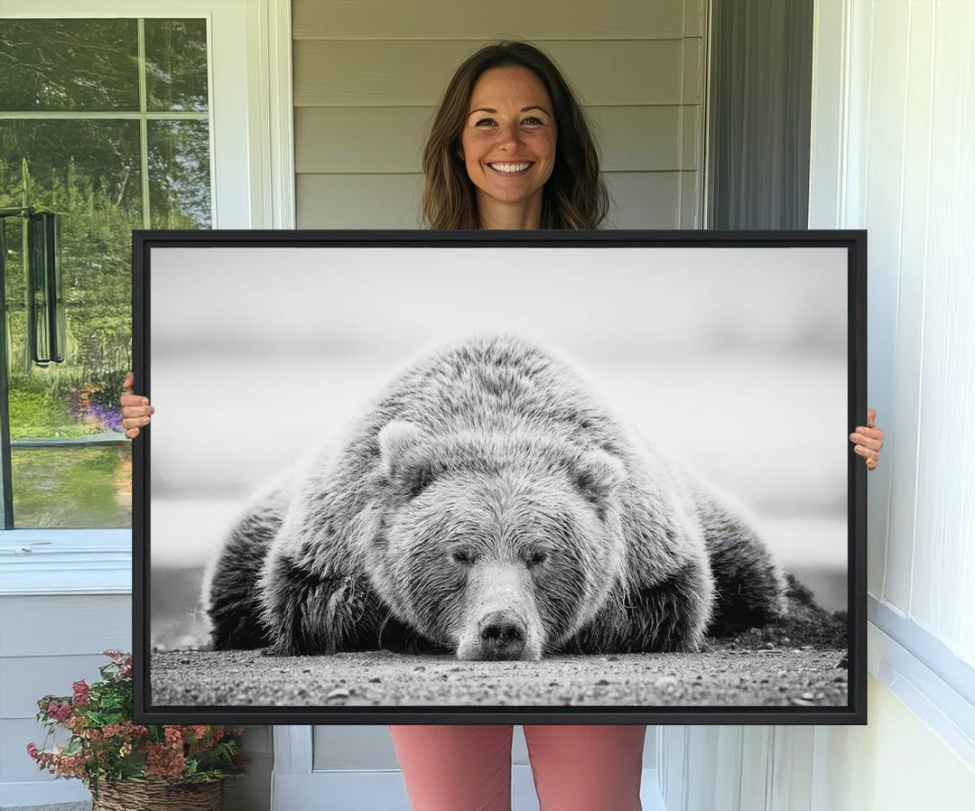 Resting Grizzly Bear wall art displayed in a modern room.