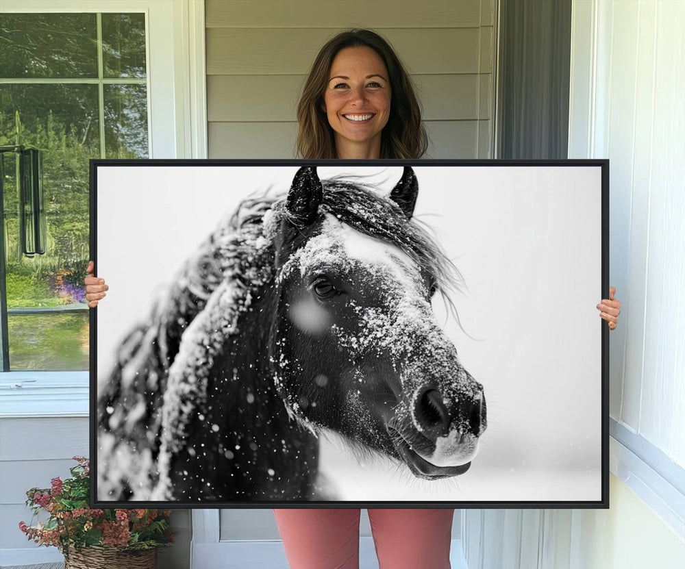 A large 3-panel rustic farmhouse wall art showcases a black and white winter horse canvas print against a snowy backdrop.