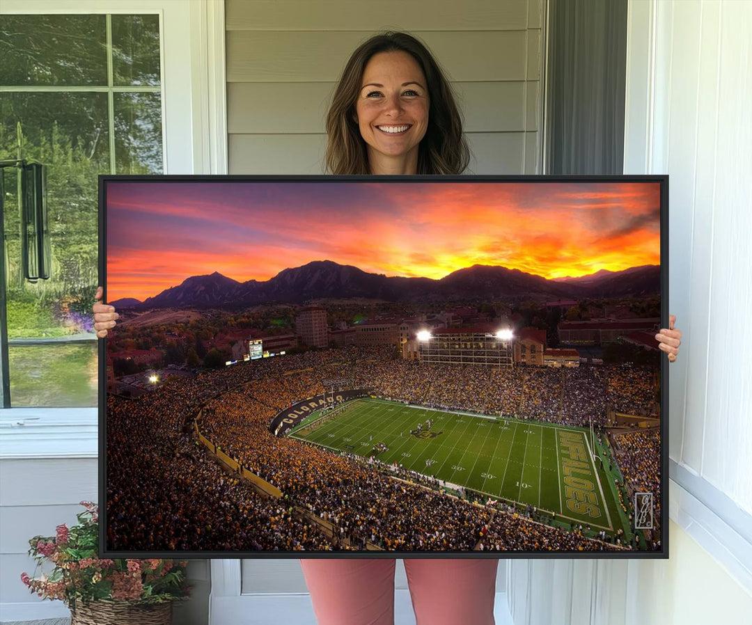 A vibrant mountain sunset at Folsom Field, home of the University of Colorado Football team, is captured in this stunning wall art canvas print.